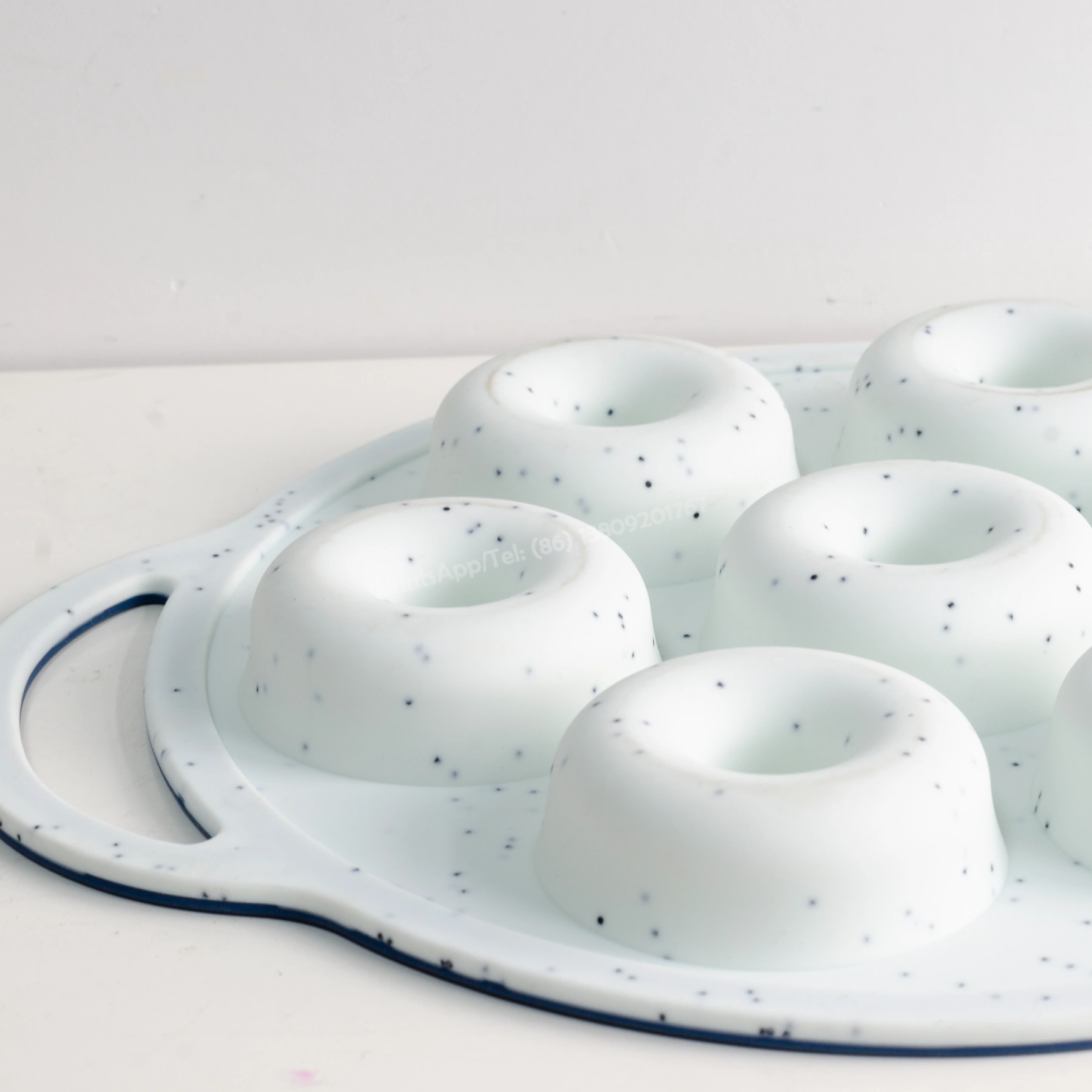 Esportatore all'ingrosso di fodere per cupcake su ordinazione della vaschetta della ciambella del silicone dell'Oem Odm
