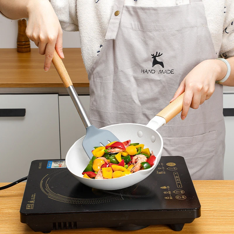 Utensílios de cozinha de aço inoxidável e silicone